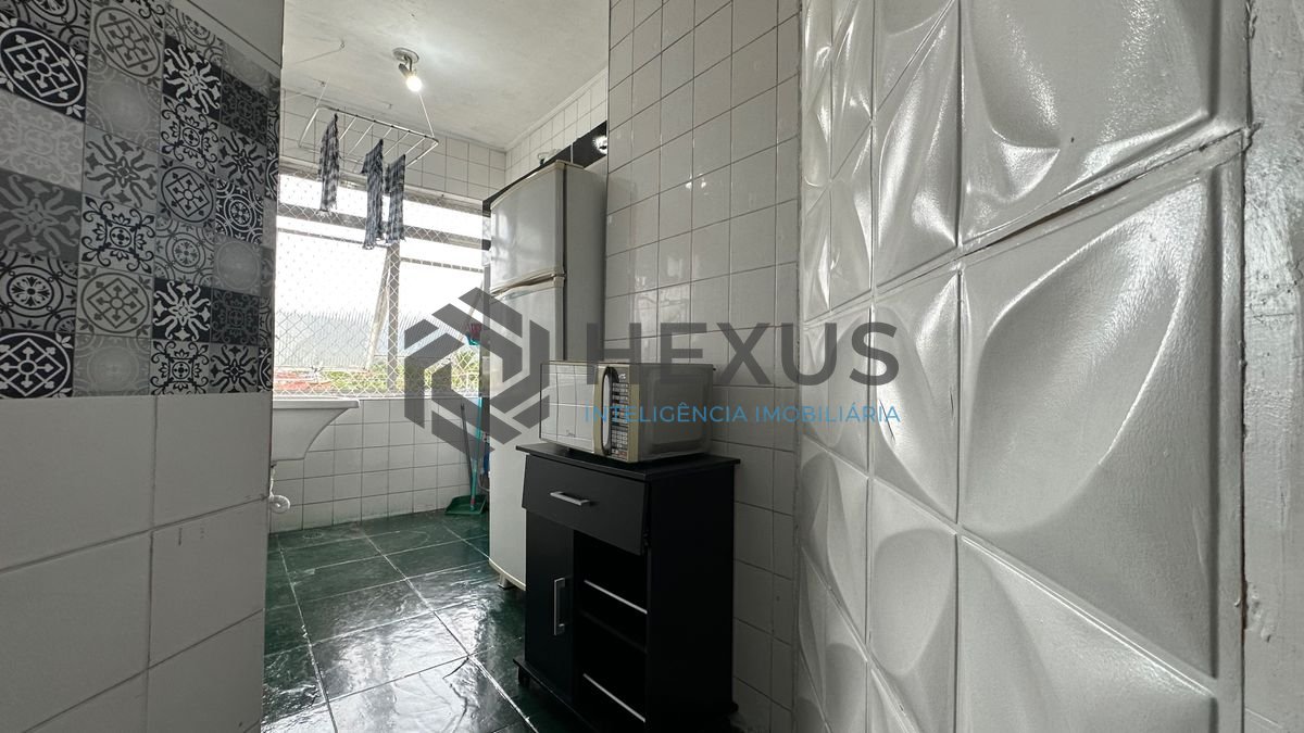 Foto 9 de Apartamento com varanda a 850m da praia na região do Tortugas na Enseada, Guarujá