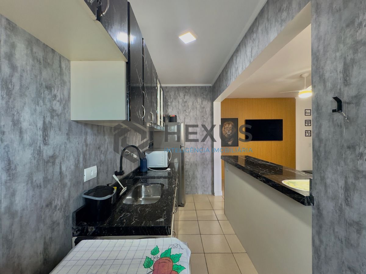 Foto 8 de Flat reformado com varanda gourmet e lazer a 1 quadra da praia nas Pitangueiras, Guarujá