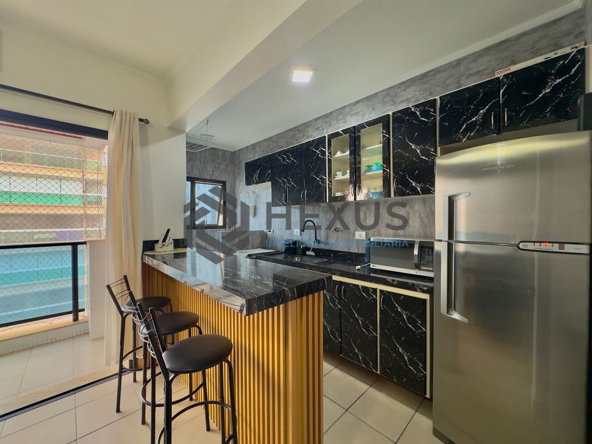 Foto 9 de Flat reformado com varanda gourmet e lazer a 1 quadra da praia nas Pitangueiras, Guarujá