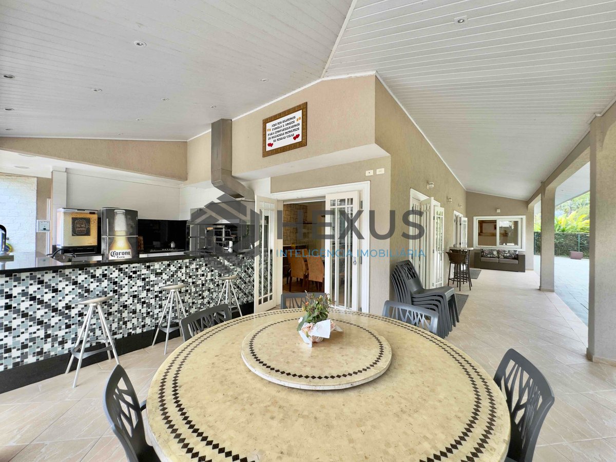 Foto 8 de Casa reformada com varanda piscina e área gourmet no Granville na Praia da Enseada, Guaruja