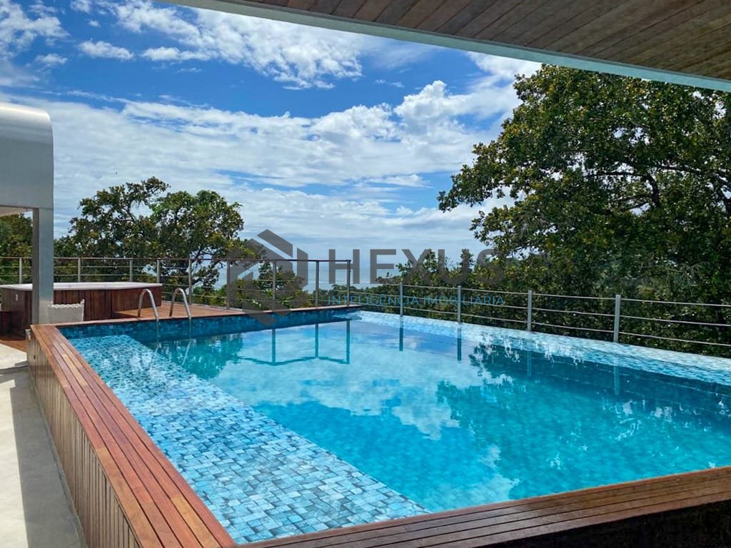 Foto 3 de Casa luxuosa de alto padrão no Condomínio Iporanga, Guaruja