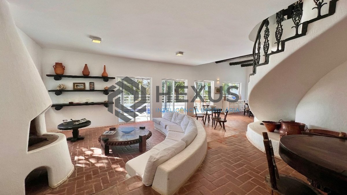 Foto 12 de Casa frente mar com piscina e área gourmet no Condomínio Península na Praia da Enseada, Guaruja