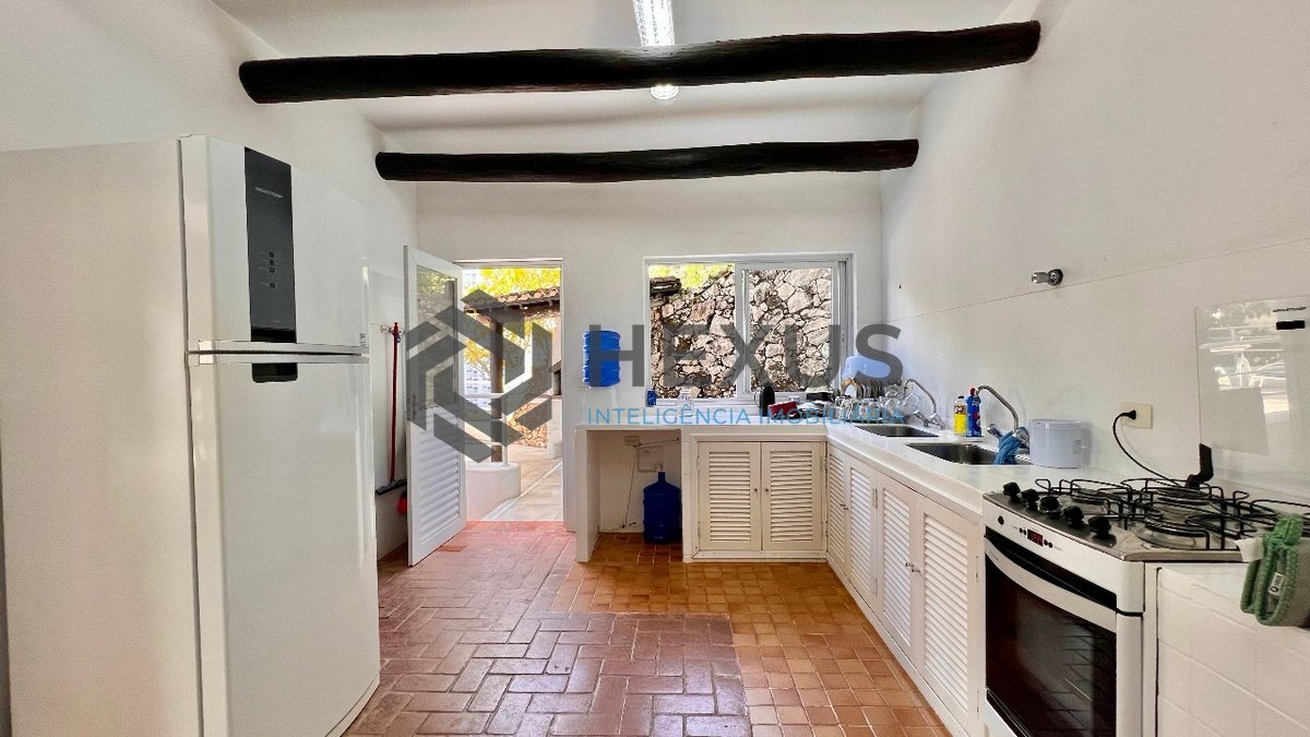Foto 19 de Casa frente mar com piscina e área gourmet no Condomínio Península na Praia da Enseada, Guaruja
