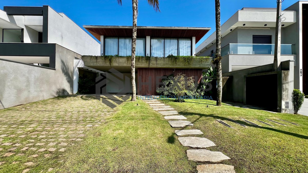 Foto 7 de Residência de Alto Padrão no Jardim Acapulco – Linhas Retas, Projeto Imponente, Ambientes Integrados e Conforto Absoluto