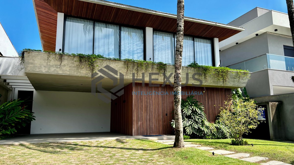Foto 10 de Residência de Alto Padrão no Jardim Acapulco – Linhas Retas, Projeto Imponente, Ambientes Integrados e Conforto Absoluto