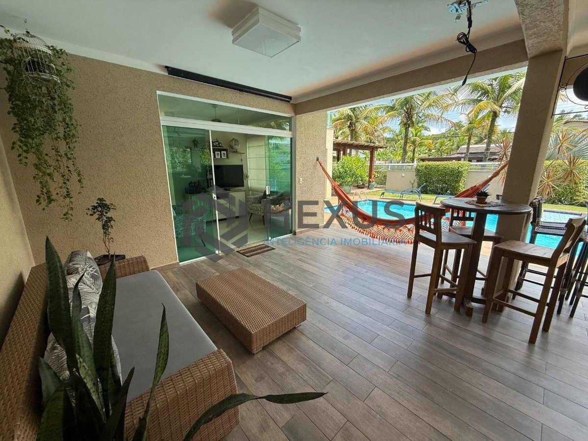 Foto 12 de Casa reformada com piscina e área gourmet no Jardim Pernambuco I, Guaruja