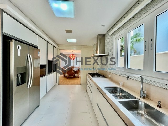 Foto 11 de Casa reformada com piscina e área gourmet no Jardim Pernambuco I, Guarujá