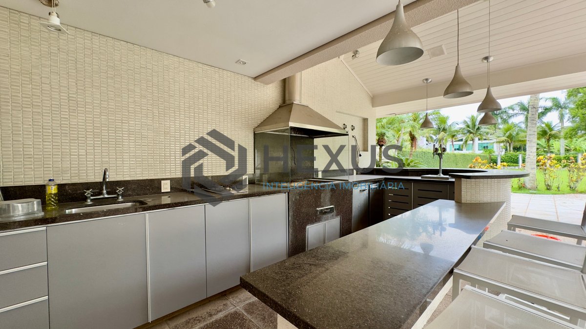 Foto 32 de Casa reformada com piscina e área gourmet no Jardim Pernambuco I, Guarujá
