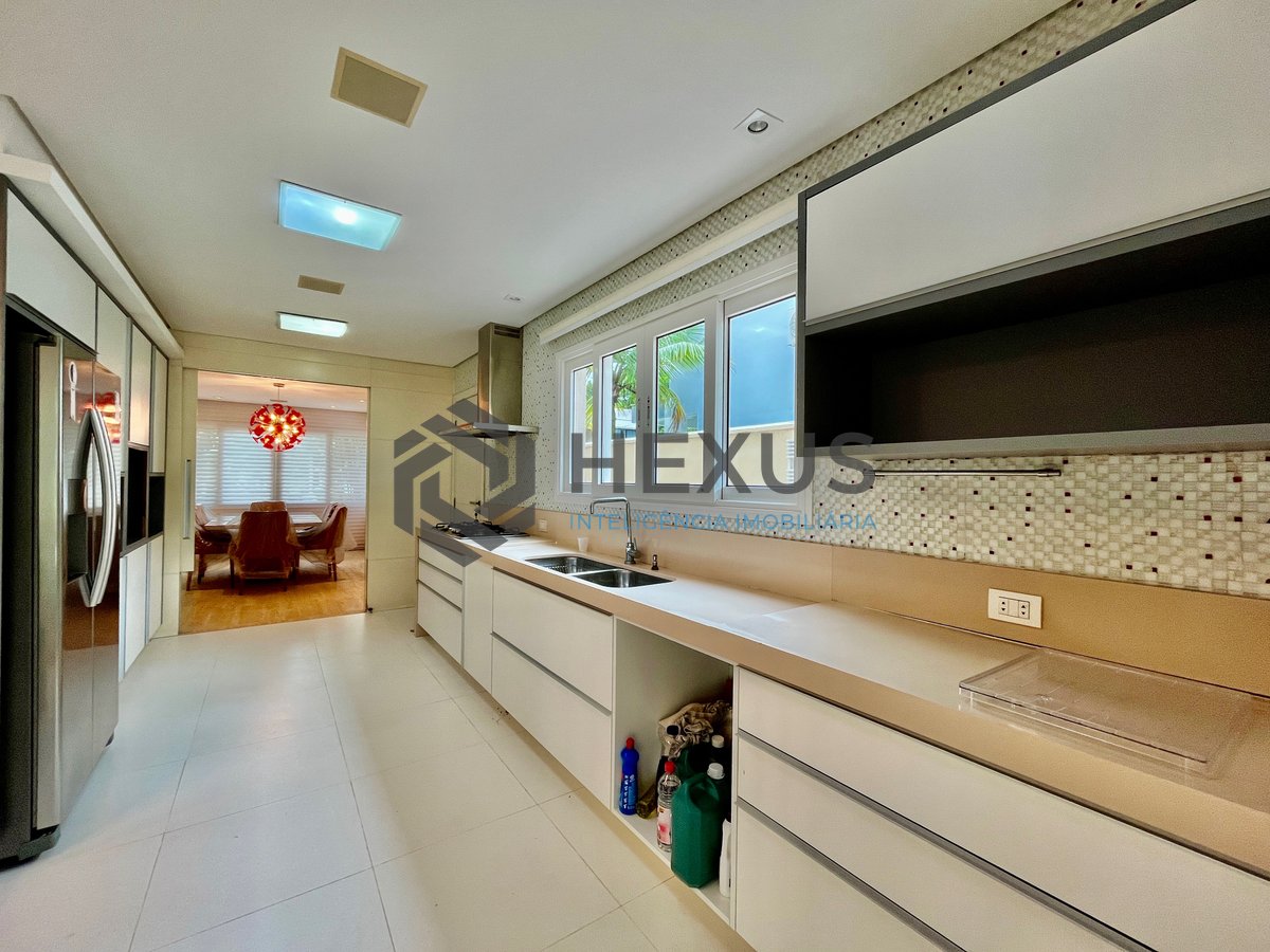 Foto 9 de Casa reformada com piscina e área gourmet no Jardim Pernambuco I, Guarujá