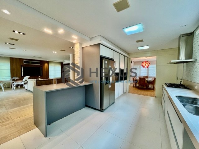 Foto 10 de Casa reformada com piscina e área gourmet no Jardim Pernambuco I, Guarujá