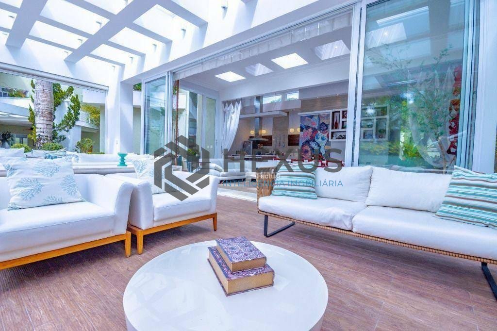 Foto 6 de Casa reformada com varanda gourmet e piscina no Jardim Pernambuco I, Guarujá