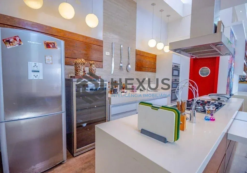 Foto 7 de Casa reformada com varanda gourmet e piscina no Jardim Pernambuco I, Guarujá