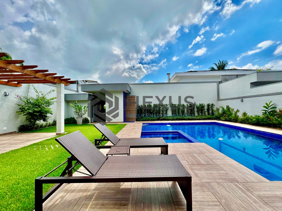 Foto 12 de Casa reformada de alto padrão com piscina e área gourmet no Jardim Acapulco, Guaruja