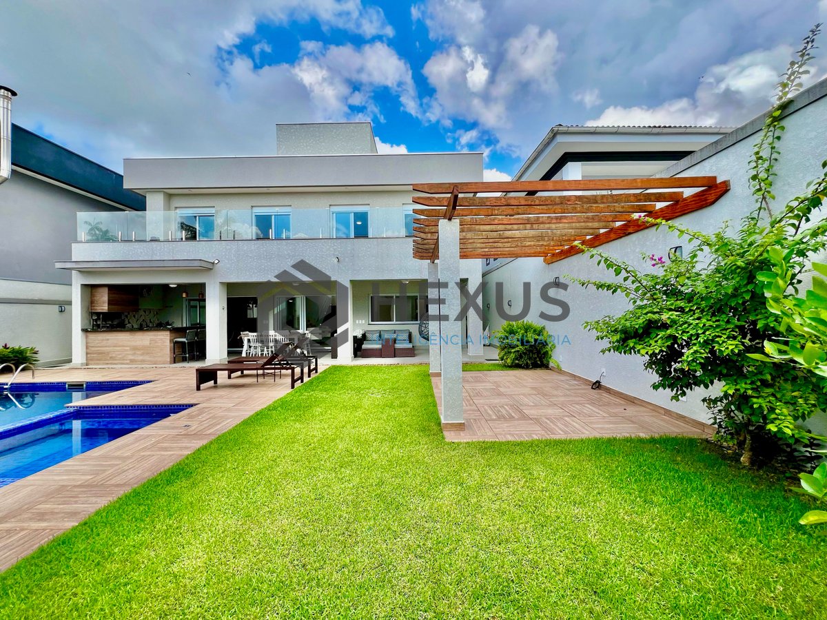 Foto 10 de Casa reformada de alto padrão com piscina e área gourmet no Jardim Acapulco, Guaruja