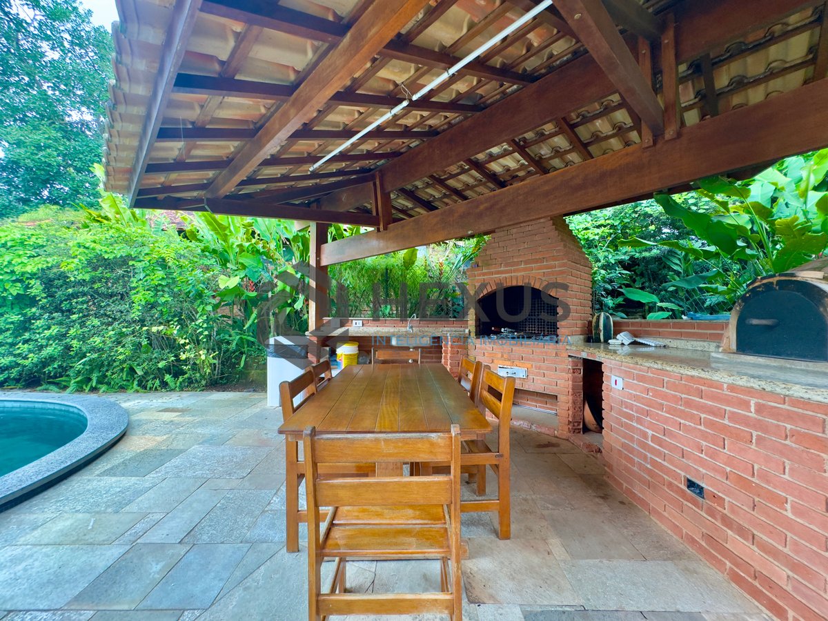 Foto 11 de Casa com piscina e área gourmet no Condomínio Granville na Praia da Enseada, Guaruja