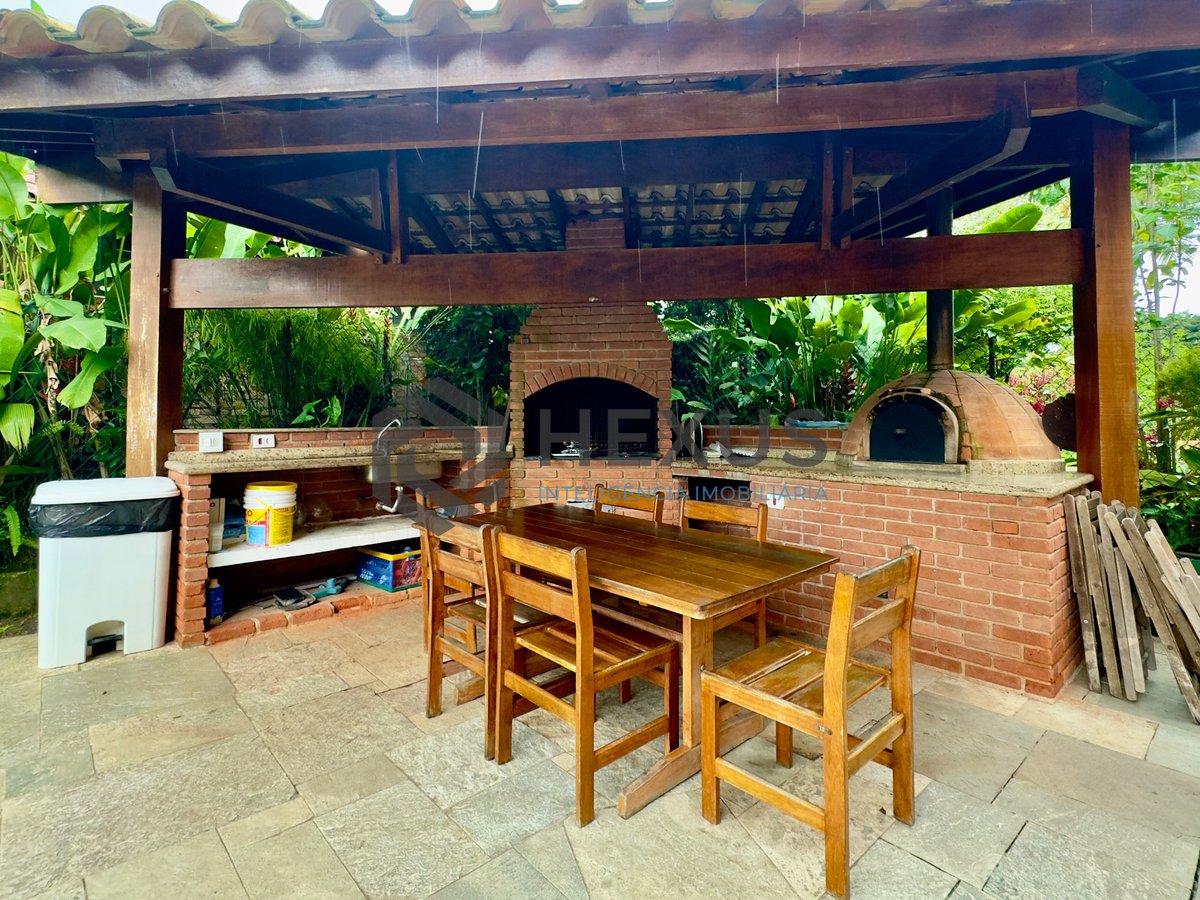 Foto 10 de Casa com piscina e área gourmet no Condomínio Granville na Praia da Enseada, Guaruja