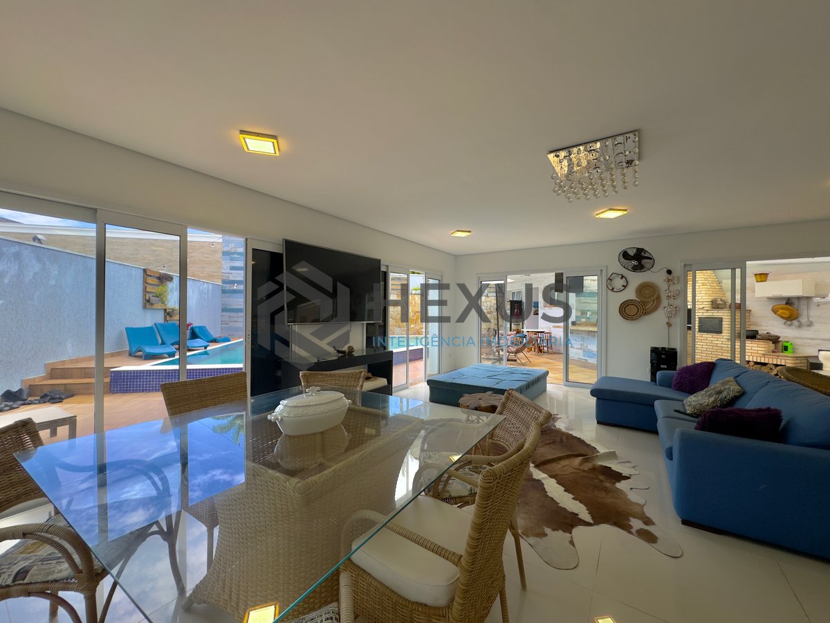 Foto 14 de Casa reformada com piscina e área gourmet no Condomínio Jardim Acapulco, Guaruja