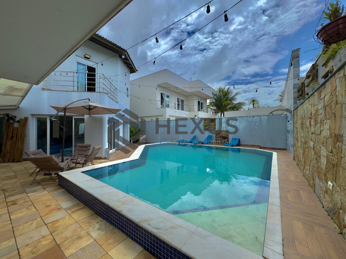 Foto 7 de Casa reformada com piscina e área gourmet no Condomínio Jardim Acapulco, Guaruja