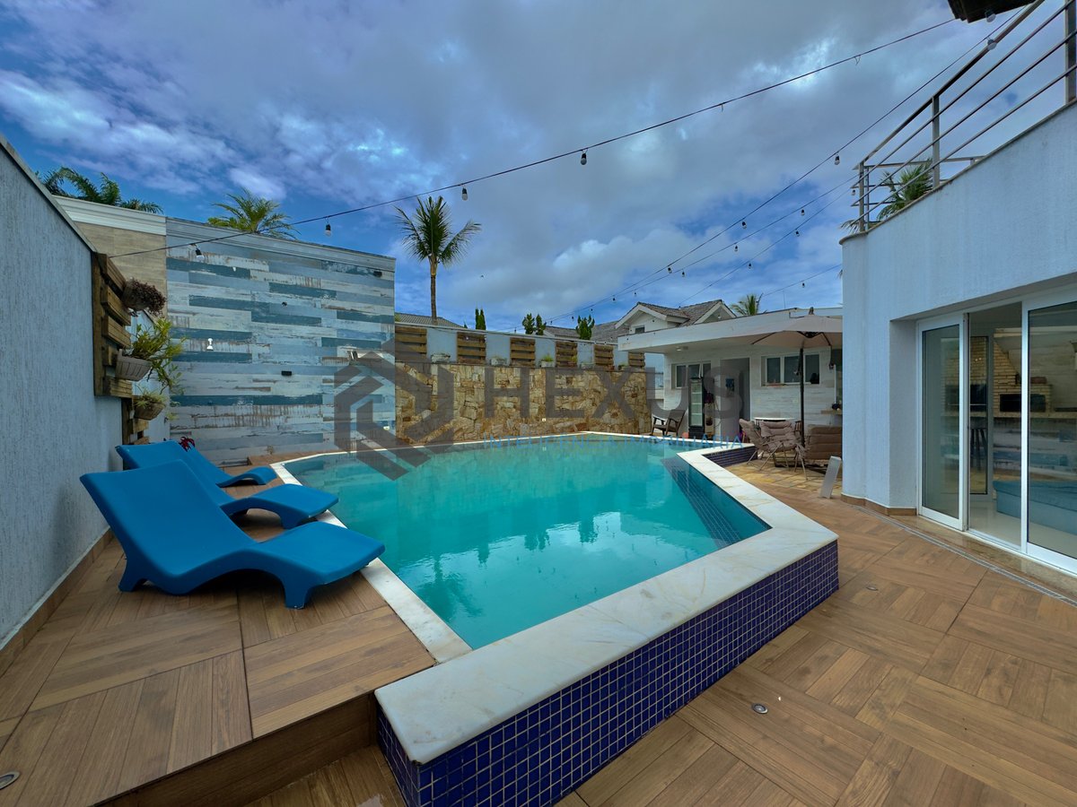 Foto 8 de Casa reformada com piscina e área gourmet no Condomínio Jardim Acapulco, Guaruja