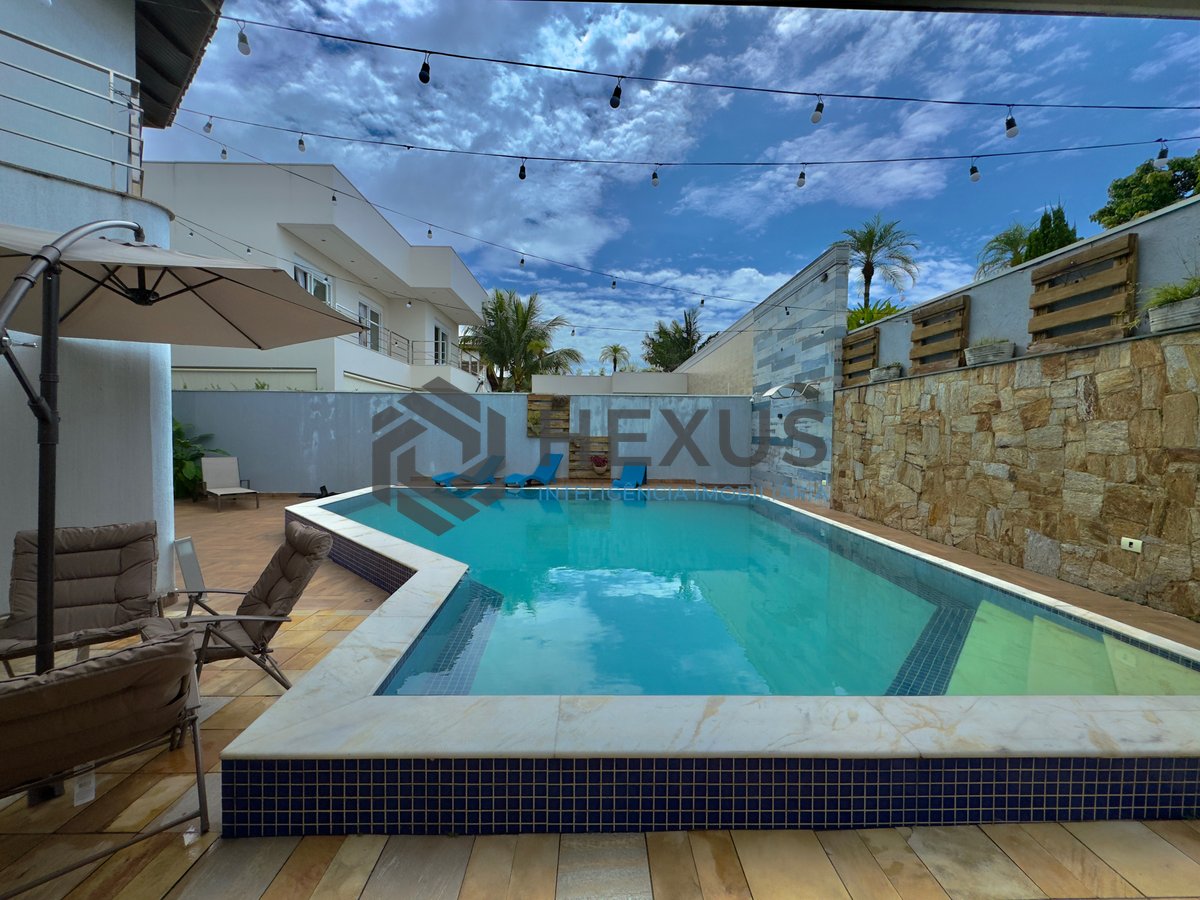 Foto 9 de Casa reformada com piscina e área gourmet no Condomínio Jardim Acapulco, Guaruja