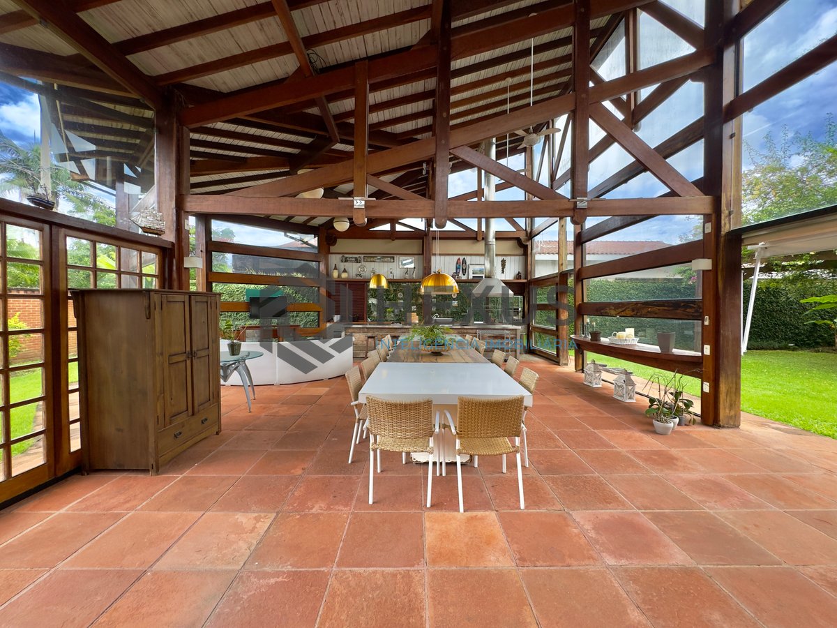 Foto 11 de Casa Rústica com piscina e área gourmet no Jardim Acapulco, Guaruja