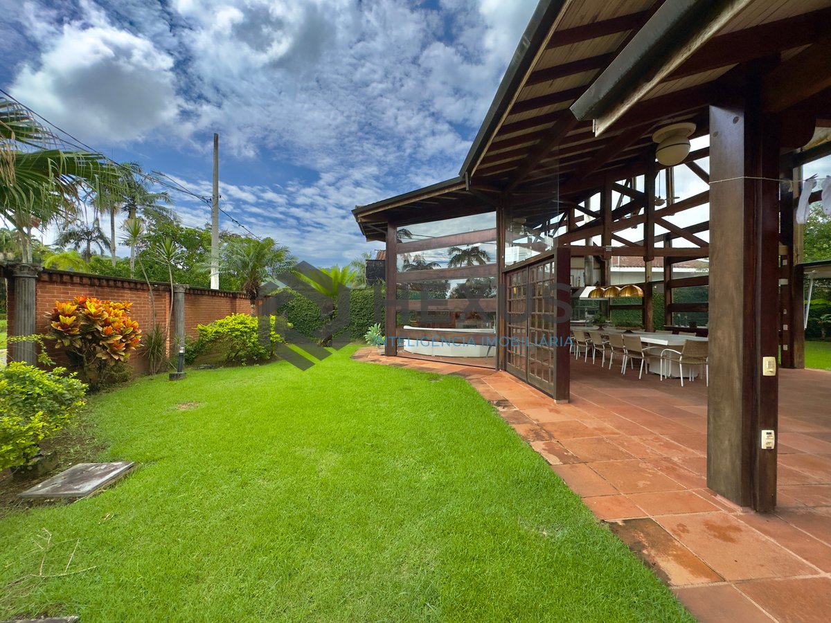 Foto 12 de Casa Rústica com piscina e área gourmet no Jardim Acapulco, Guaruja
