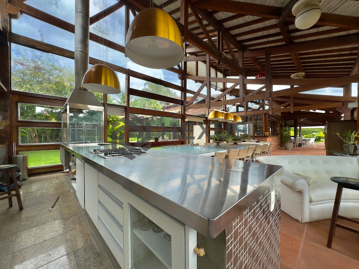 Foto 16 de Casa Rústica com piscina e área gourmet no Jardim Acapulco, Guaruja