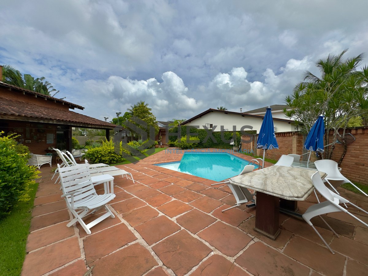 Foto 6 de Casa Rústica com piscina e área gourmet no Jardim Acapulco, Guaruja