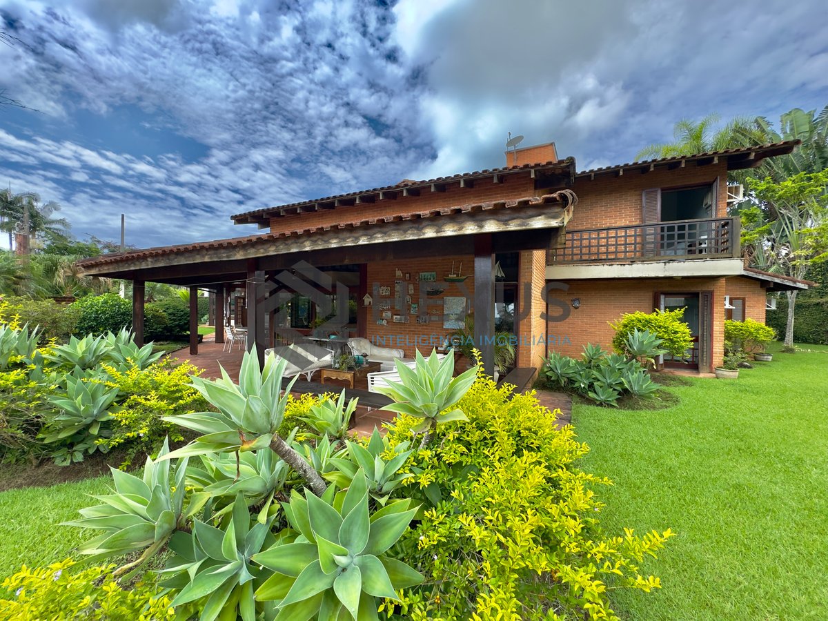 Foto 8 de Casa Rústica com piscina e área gourmet no Jardim Acapulco, Guaruja