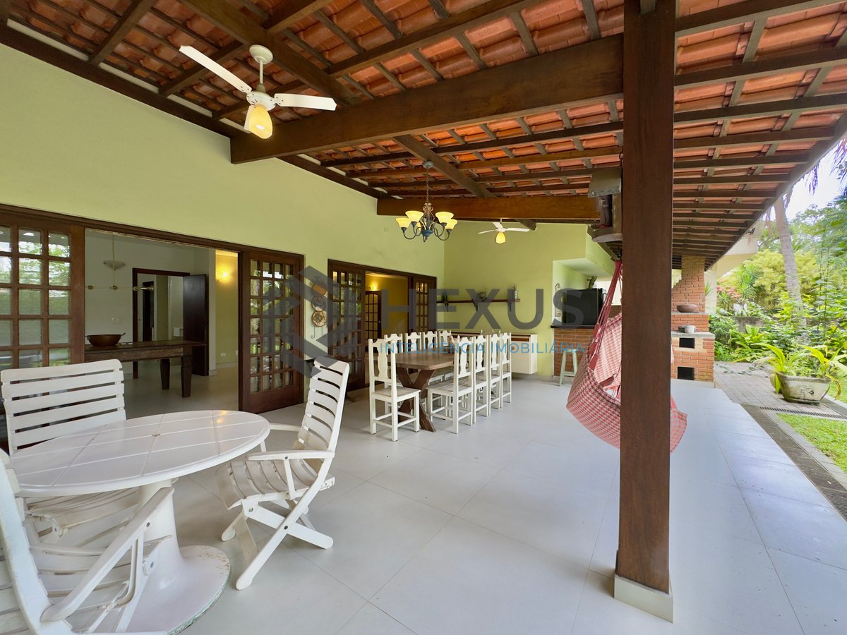 Foto 3 de Casa Charmosa com Espaço Gourmet e Muito Verde no Condomínio Granville, Guaruja