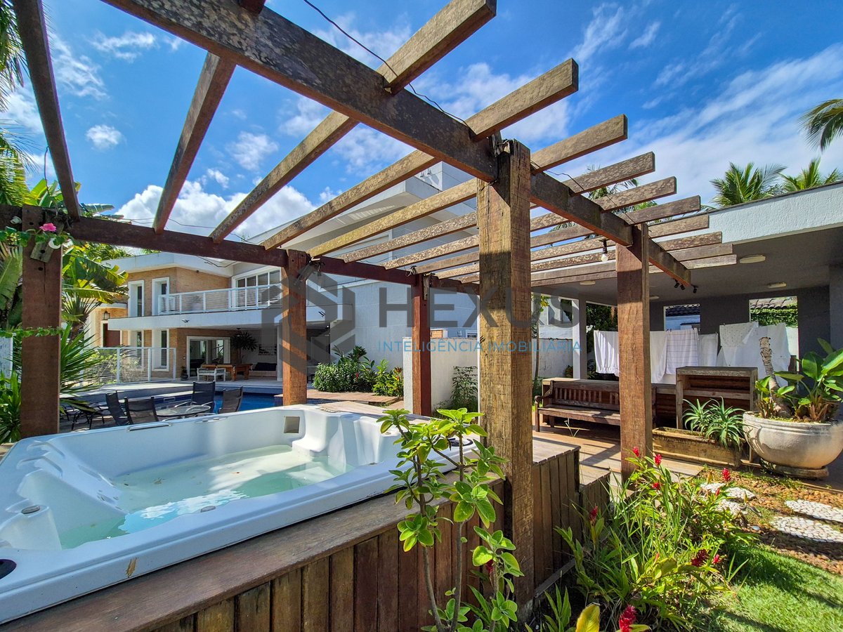 Foto 12 de Casa reformada com piscina e área gourmet no Jardim Pernambuco I, Guarujá