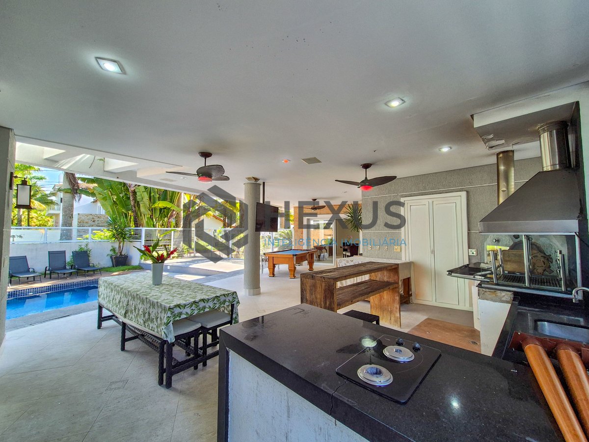 Foto 19 de Casa reformada com piscina e área gourmet no Jardim Pernambuco I, Guarujá