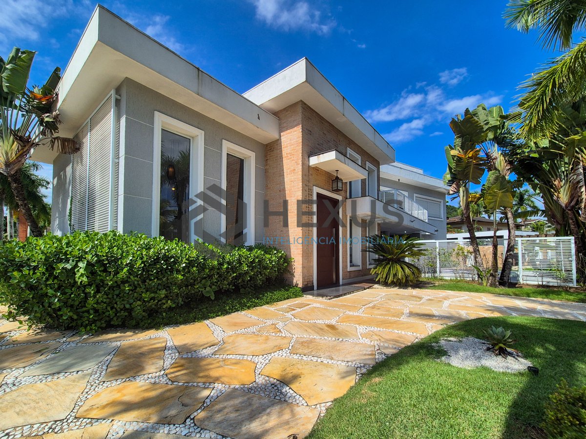 Foto 5 de Casa reformada com piscina e área gourmet no Jardim Pernambuco I, Guarujá