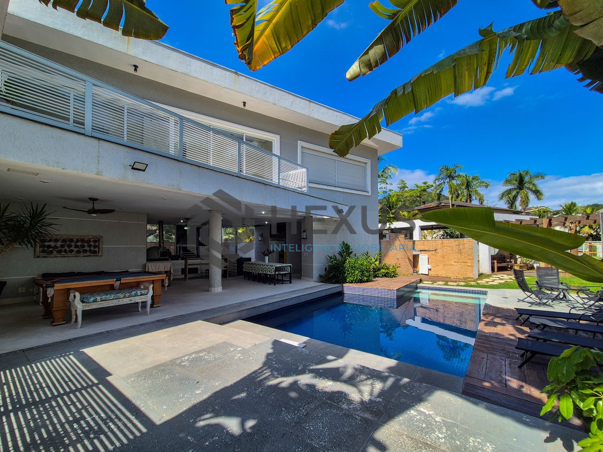 Foto 6 de Casa reformada com piscina e área gourmet no Jardim Pernambuco I, Guarujá