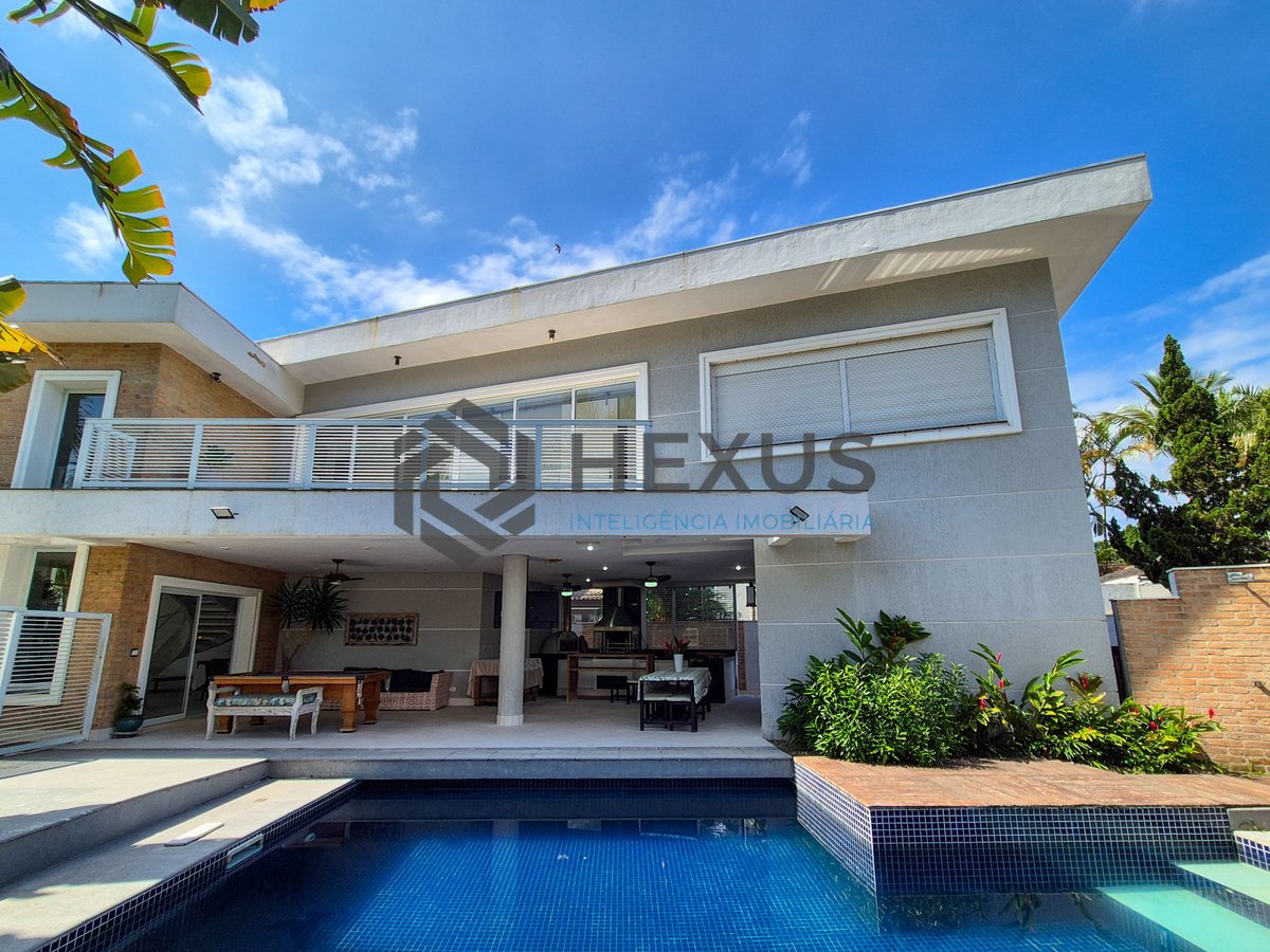 Foto 7 de Casa reformada com piscina e área gourmet no Jardim Pernambuco I, Guarujá
