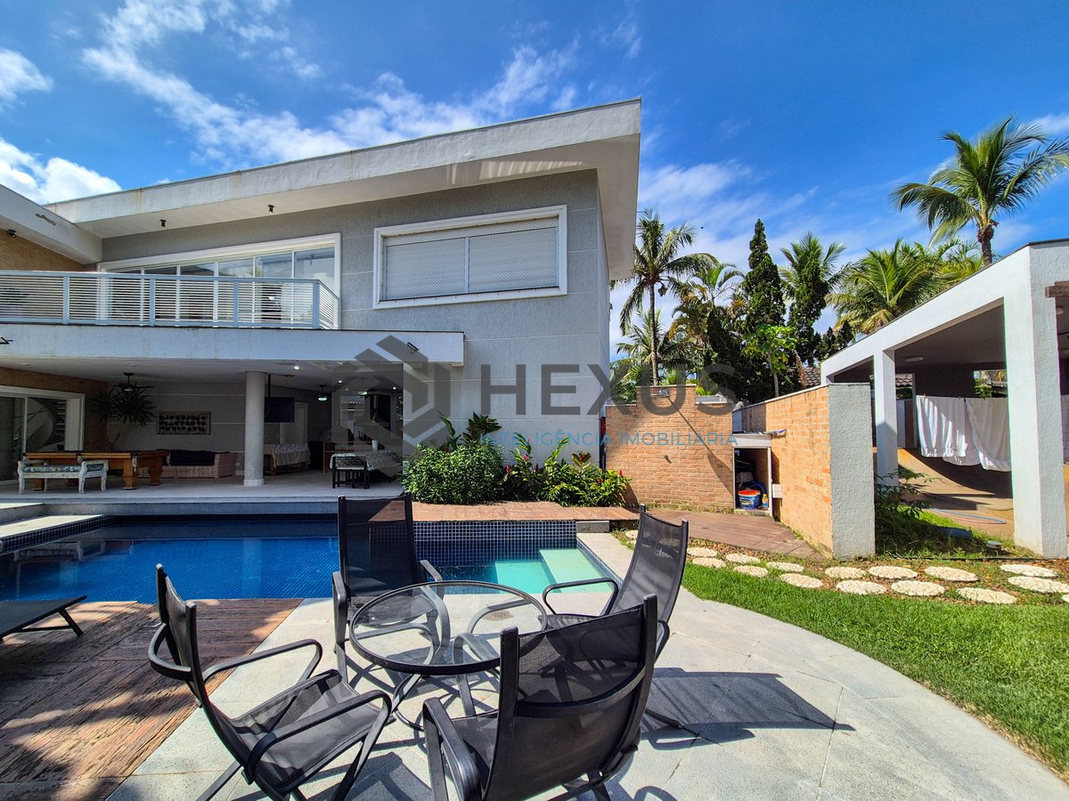 Foto 8 de Casa reformada com piscina e área gourmet no Jardim Pernambuco I, Guarujá