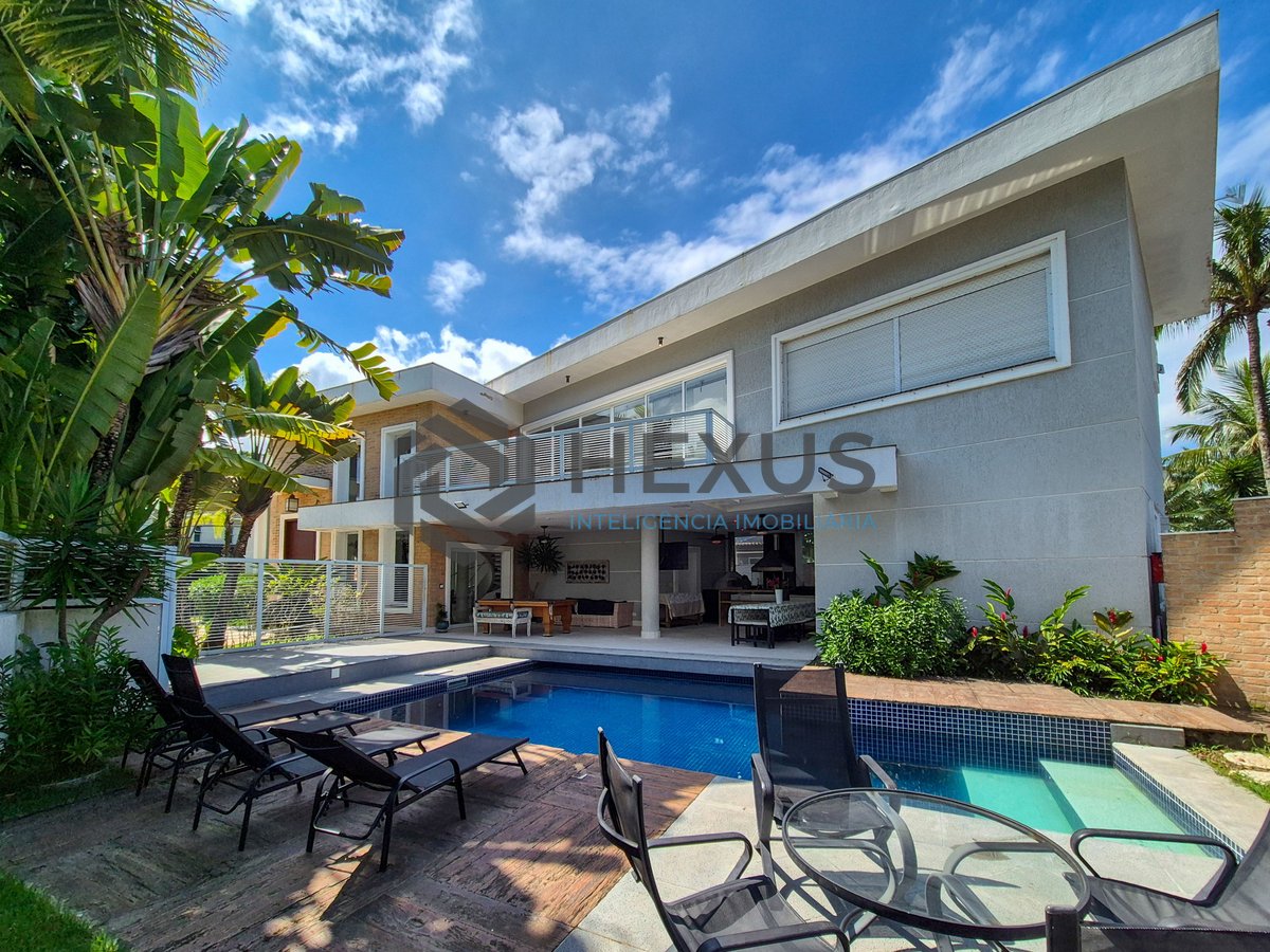 Foto 9 de Casa reformada com piscina e área gourmet no Jardim Pernambuco I, Guarujá