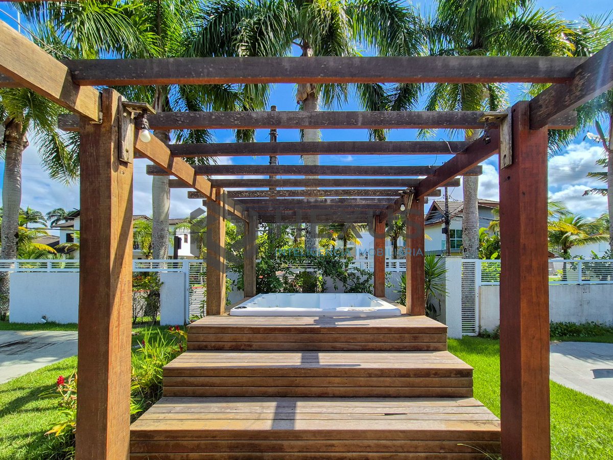 Foto 10 de Casa reformada com piscina e área gourmet no Jardim Pernambuco I, Guarujá