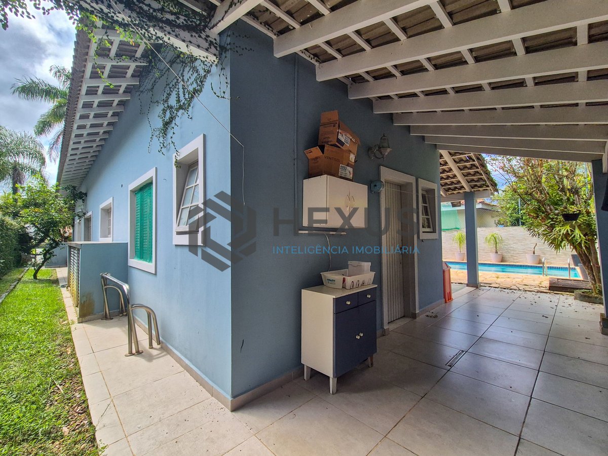 Foto 10 de Casa térrea com piscina e área gourmet no Jardim Pernambuco I, Guarujá