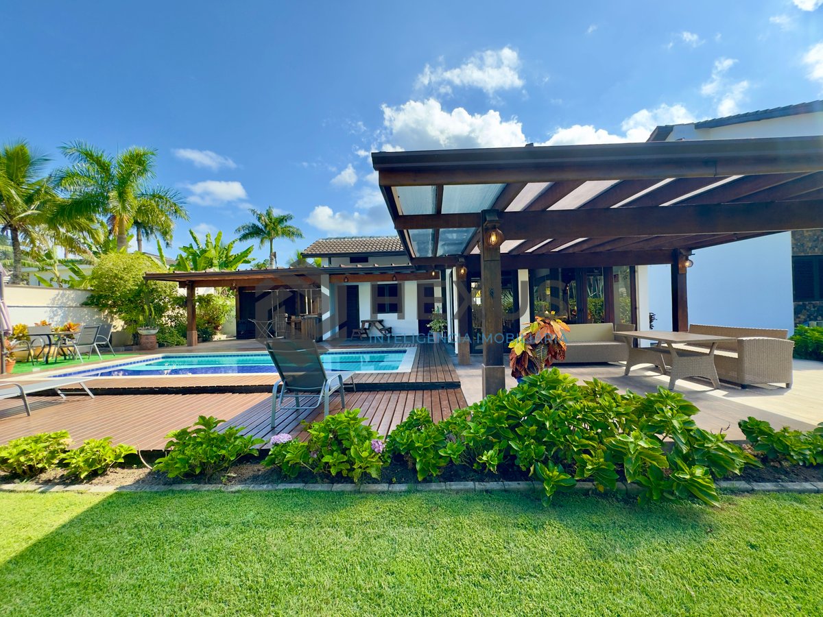 Foto 5 de Casa reformada com piscina e área gourmet no Jardim Pernambuco I, Guarujá