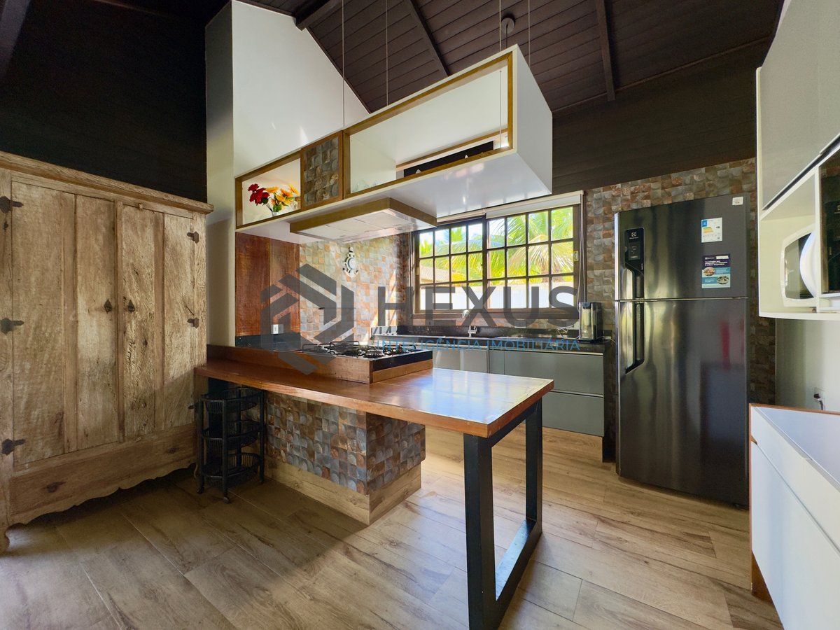 Foto 44 de Casa reformada com piscina e área gourmet no Jardim Pernambuco I, Guarujá
