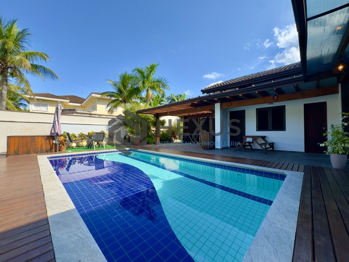 Foto 10 de Casa reformada com piscina e área gourmet no Jardim Pernambuco I, Guarujá