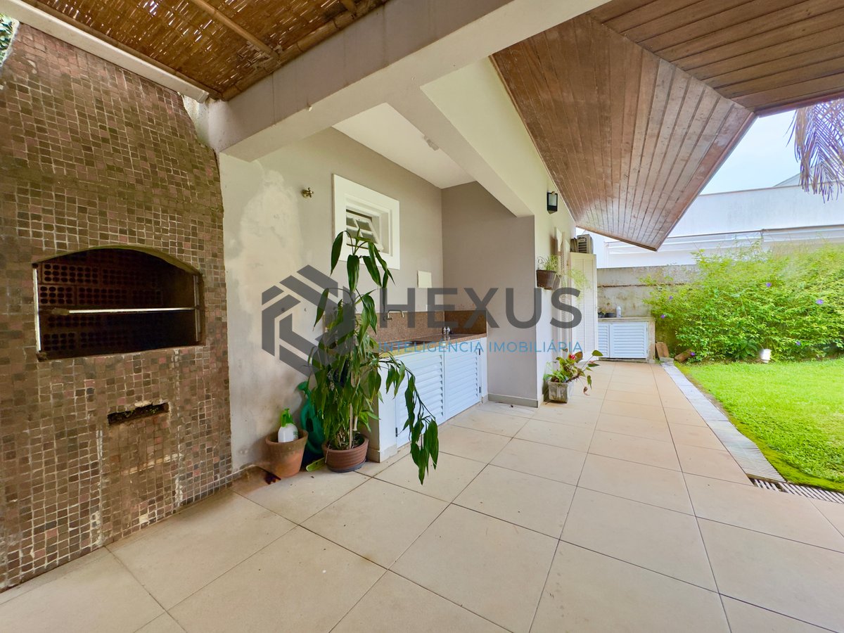 Foto 3 de Casa térrea com piscina e área gourmet no Jardim Pernambuco I, Guarujá