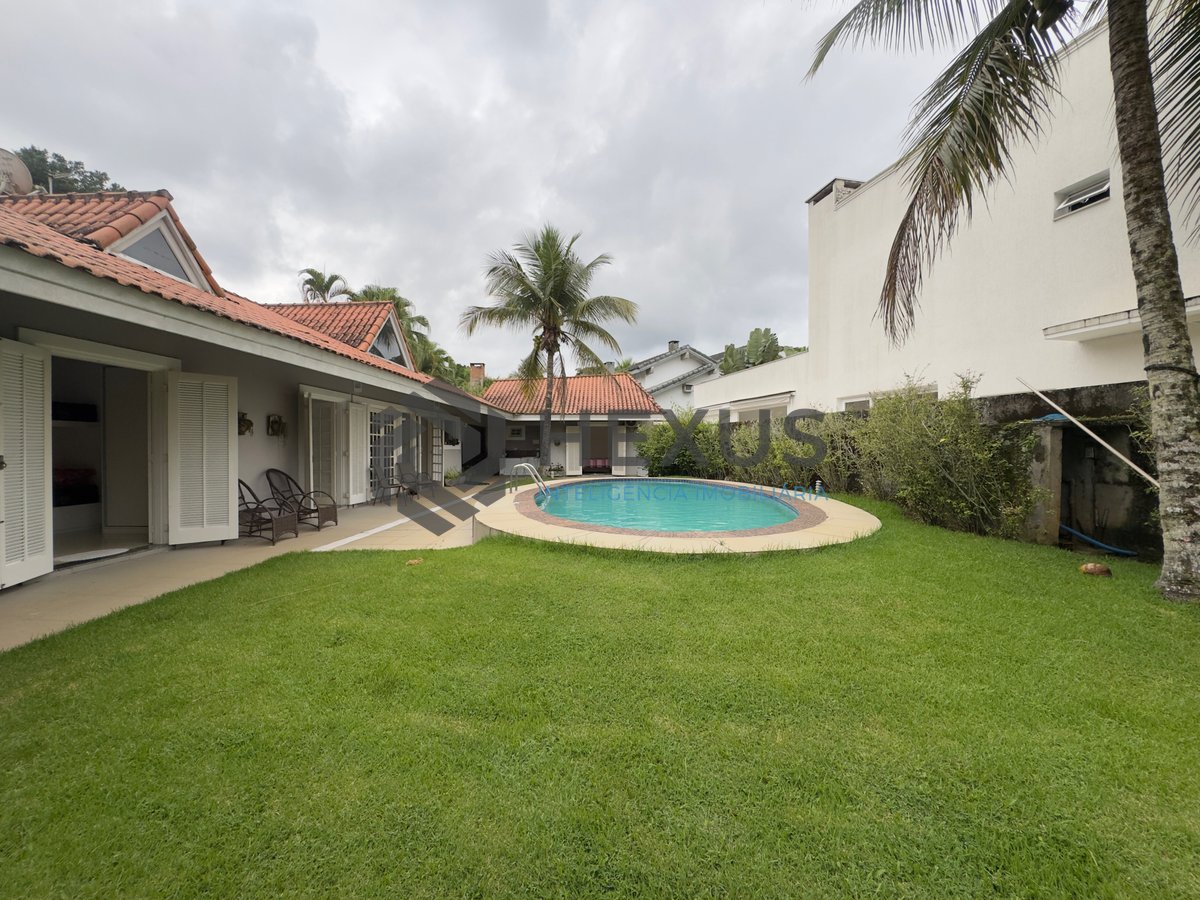 Foto 9 de Casa térrea com piscina e área gourmet no Jardim Pernambuco I, Guarujá