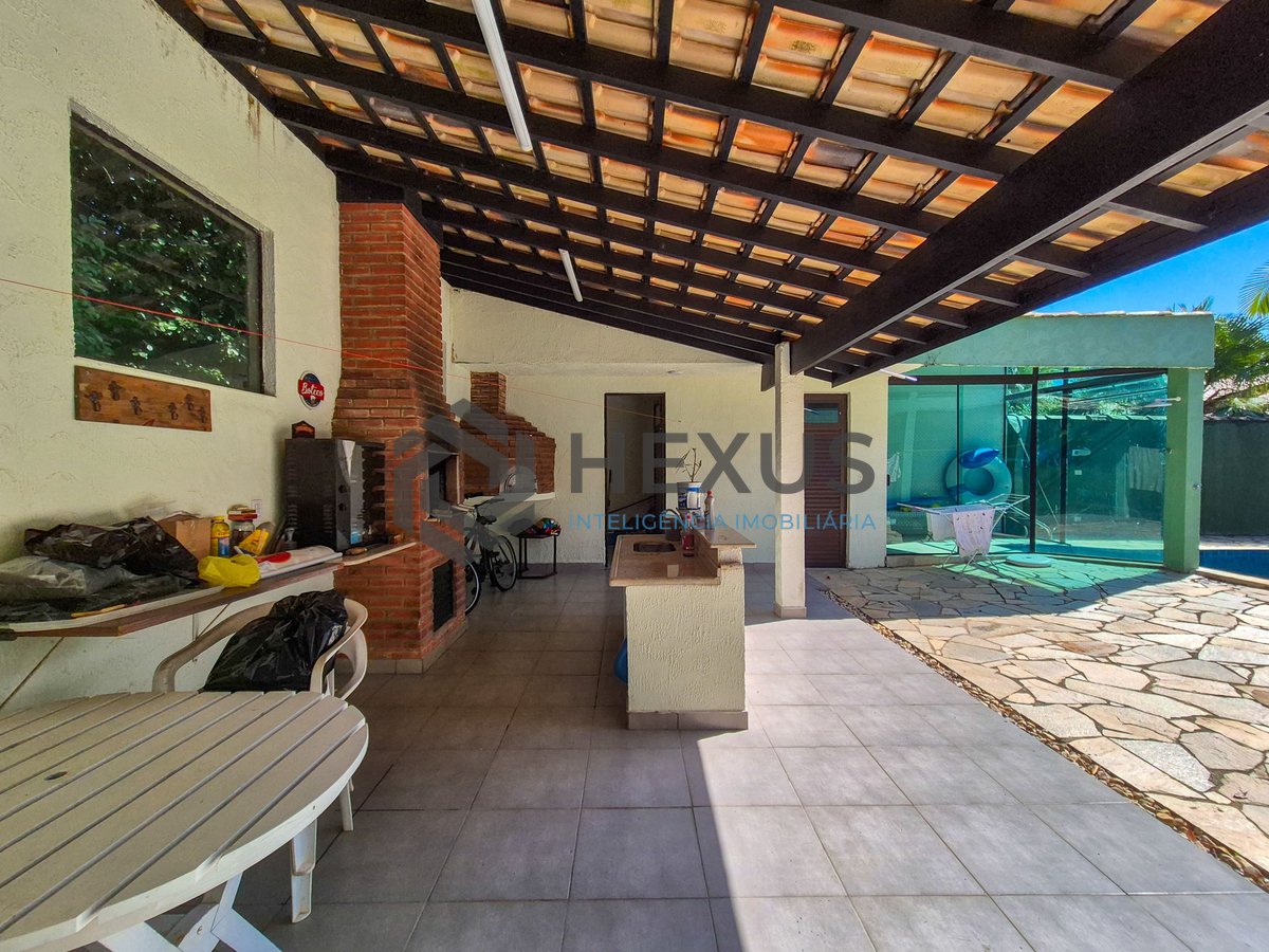 Foto 6 de Casa reformada com piscina e árae gourmet no Jardim Pernambuco II, Guarujá