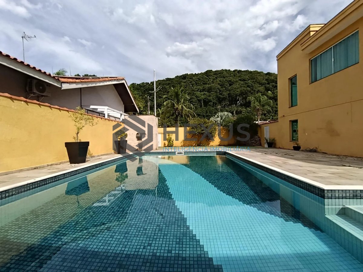 Foto 38 de Casa com varanda e lazer na região do Jardim Albamar no Balneário Praia do Pernambuco, Guarujá