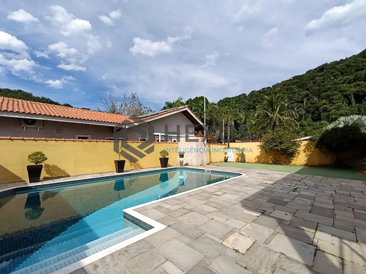 Foto 39 de Casa com varanda e lazer na região do Jardim Albamar no Balneário Praia do Pernambuco, Guarujá