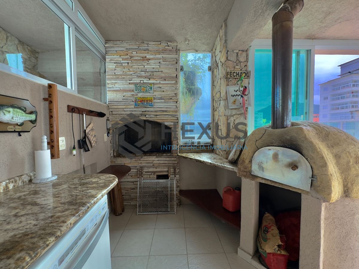 Foto 19 de Apartamento com varanda gourmet vista mar e lazer na beira mar da praia nas Pitangueiras, Guarujá