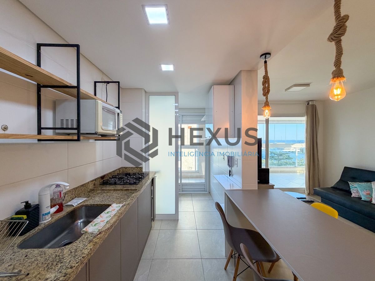 Foto 17 de Apartamento reformado com varanda gourmet vista mar a 400m da praia na região do Jardim Centenário na Enseada, Guarujá