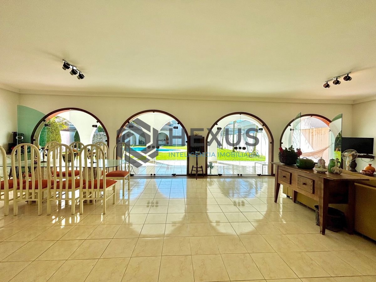 Foto 6 de Casa reformada com piscina e área gourmet no Jardim Acapulco, Guarujá